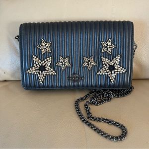 Coach fold over chain clutch with quilting and crystal embellishment